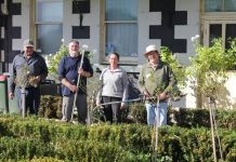 Getting their hands dirty to clean up