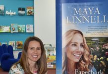 Romance writer returns to region