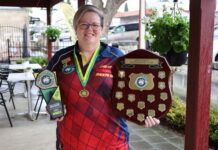 Darts champ hits the target